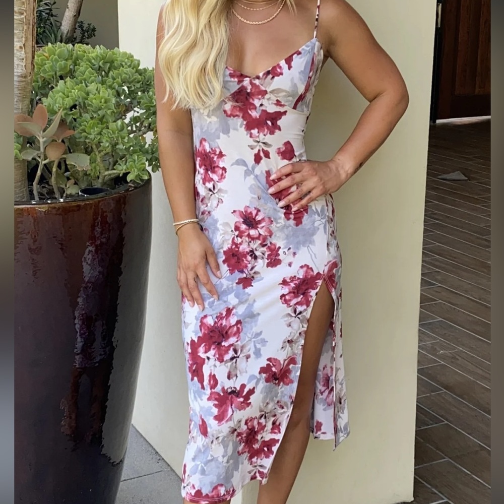 Tan cocktail dress with gray and red floral pattern.